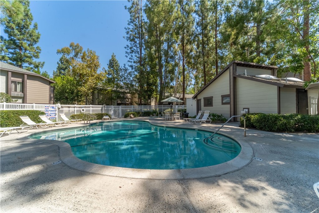 20702 El Toro Road, Unit 413 Lake Forest, CA 92630 - Photo 21 of 29 a view of a swimming pool with a patio