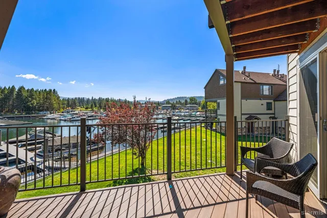 a view of a balcony with wooden floor