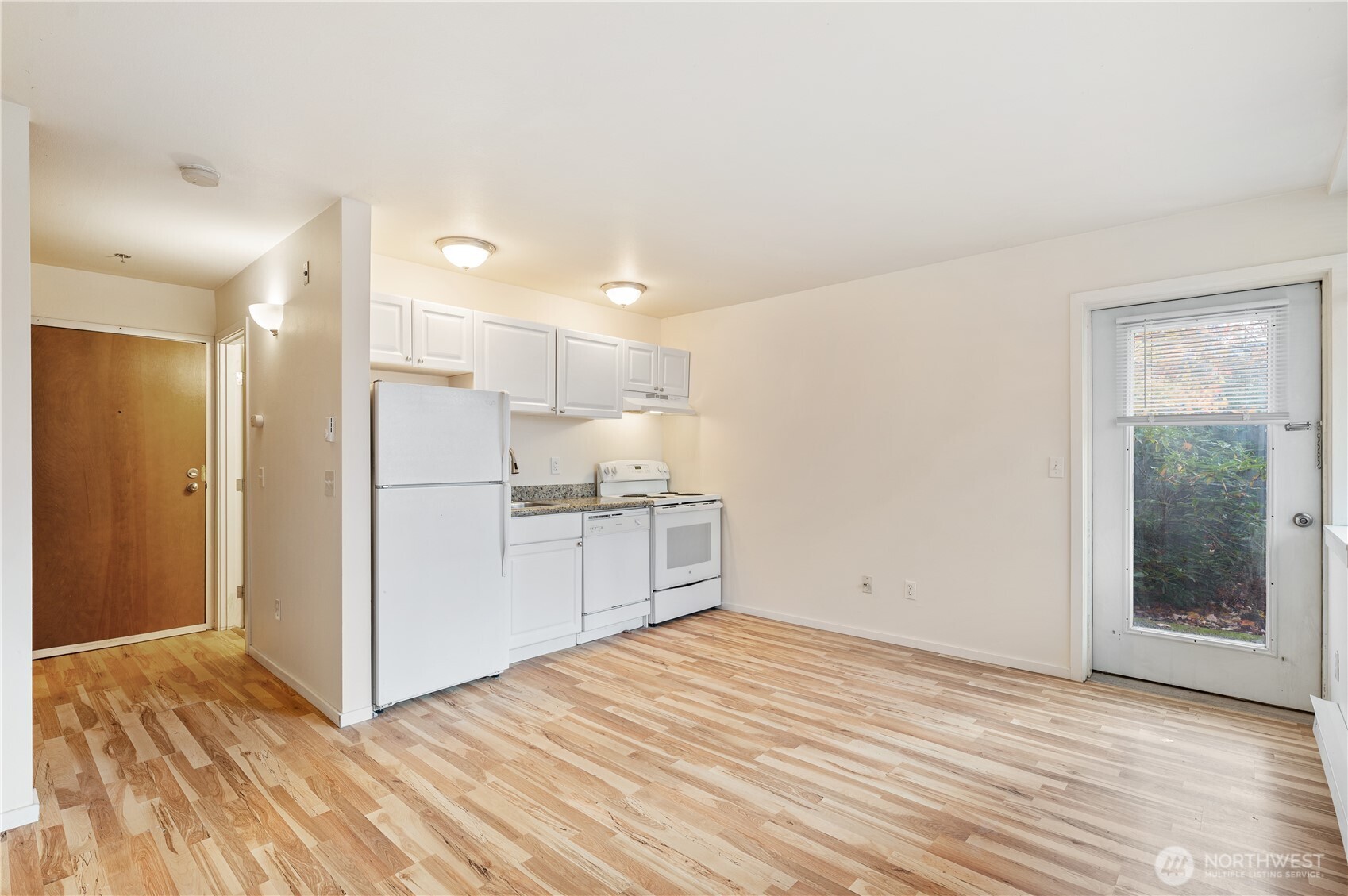 802 North 43rd Street Seattle, WA 98103 - Photo 9 of 18 a view of kitchen with wooden floor