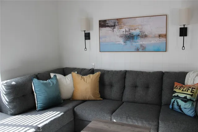 a living room with furniture and a couch