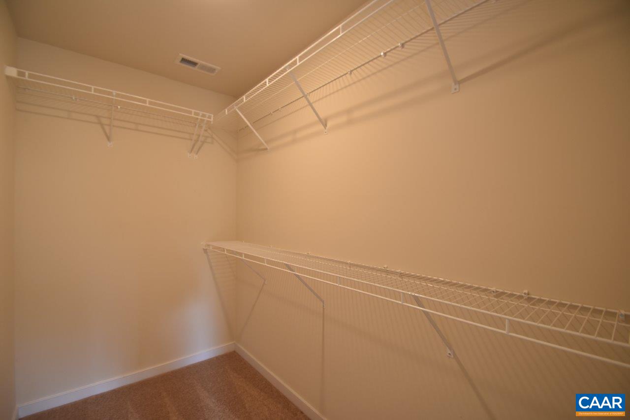 24 Haversack Road, Unit LOT 373 Palmyra, VA 22963 - Photo 12 of 15 a view of a room with racks on the wall