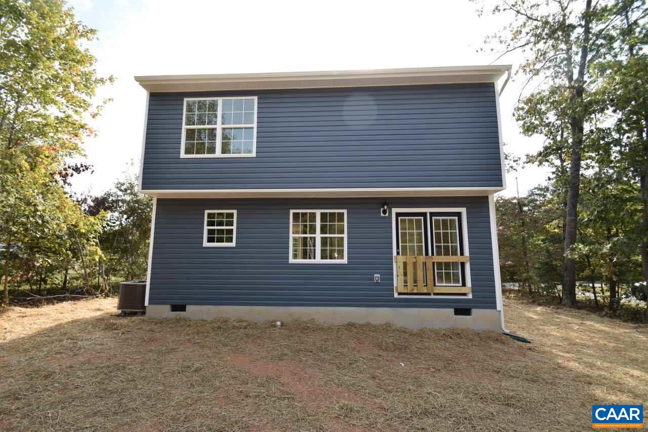 24 Haversack Road, Unit LOT 373 Palmyra, VA 22963 - Photo 3 of 15 a front view of a house with a yard and garage