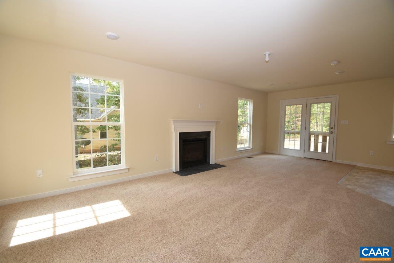 24 Haversack Road, Unit LOT 373 Palmyra, VA 22963 - Photo 4 of 15 an empty room with windows