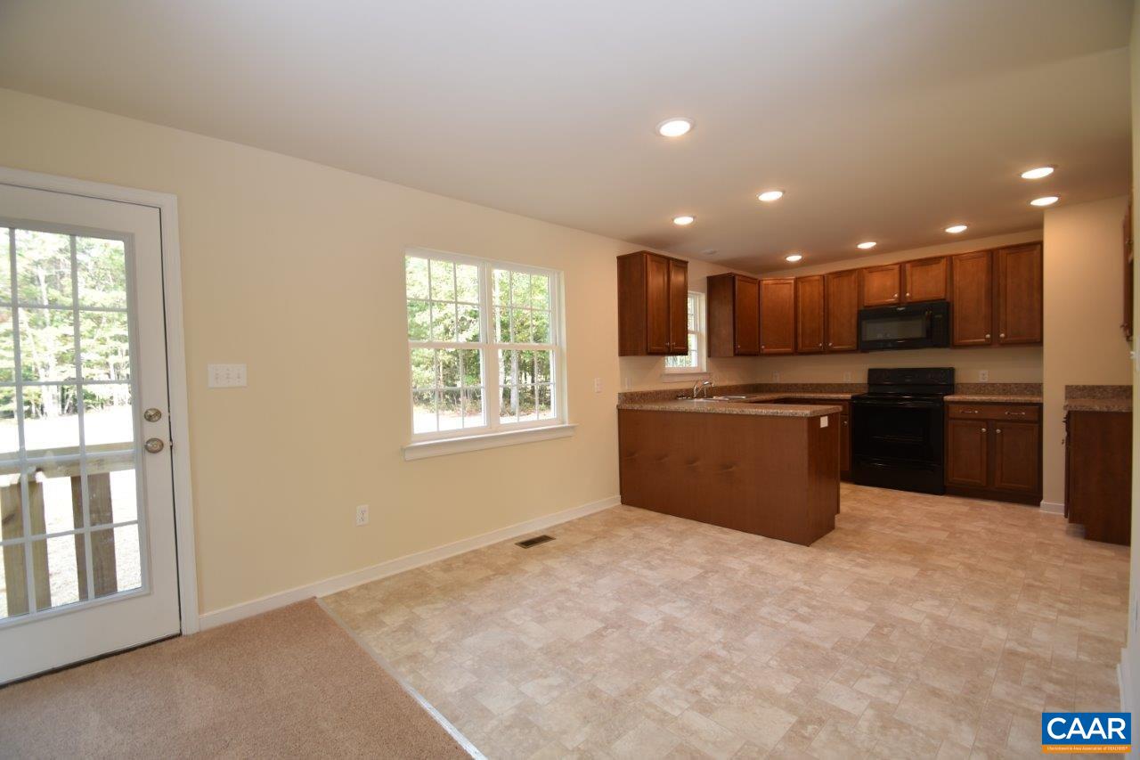 24 Haversack Road, Unit LOT 373 Palmyra, VA 22963 - Photo 7 of 15 a kitchen with a refrigerator and a sink