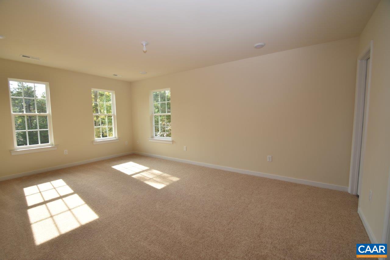 24 Haversack Road, Unit LOT 373 Palmyra, VA 22963 - Photo 10 of 15 an empty room with windows