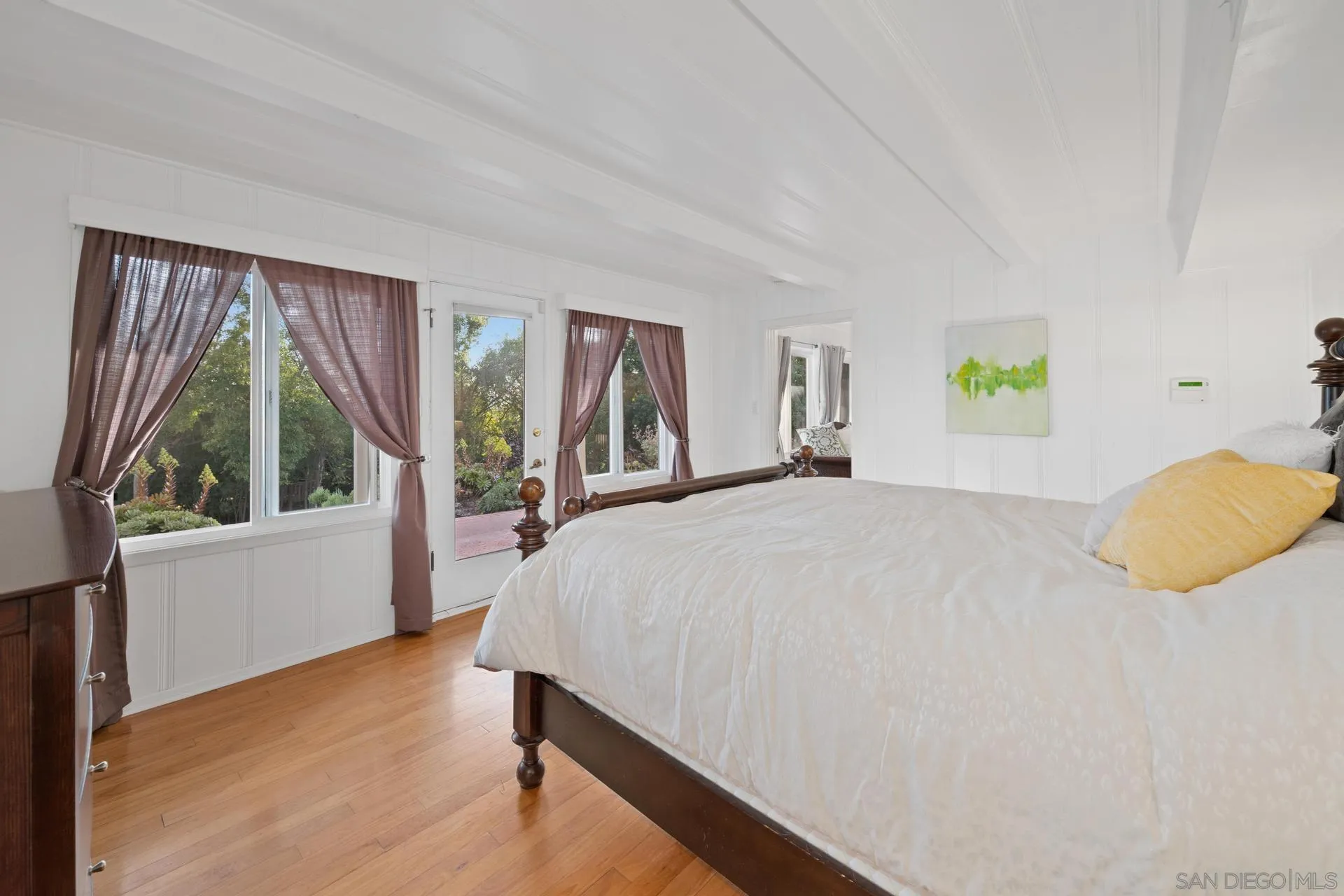 6347 Las Colinas Rancho Santa Fe, CA 92067 - Photo 12 of 24 a bedroom with a bed and a large window