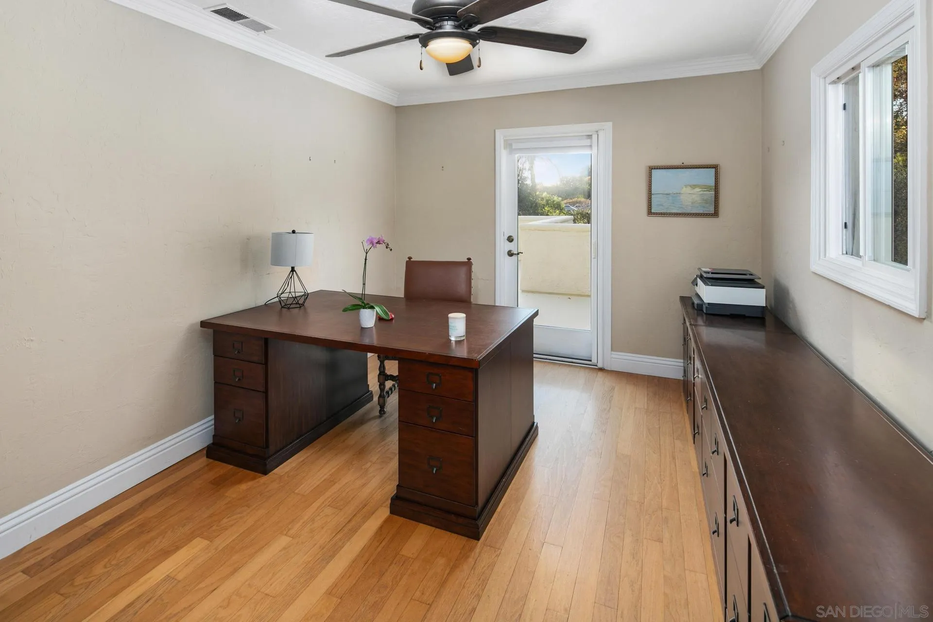 6347 Las Colinas Rancho Santa Fe, CA 92067 - Photo 17 of 24 a room with wooden floor and window