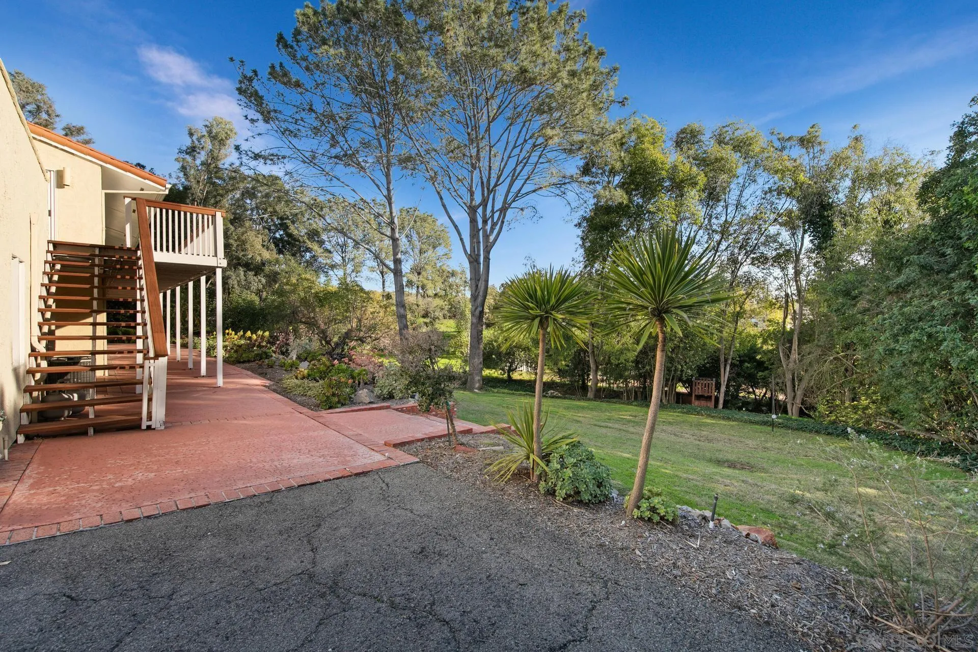 6347 Las Colinas Rancho Santa Fe, CA 92067 - Photo 20 of 24 a view of a park with swings and slides