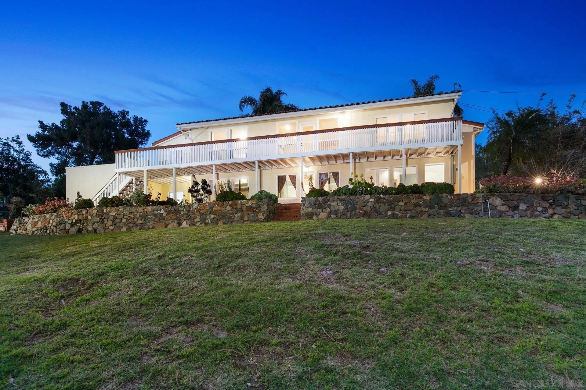 6347 Las Colinas Rancho Santa Fe, CA 92067 - Photo 24 of 24 a front view of a house with garden