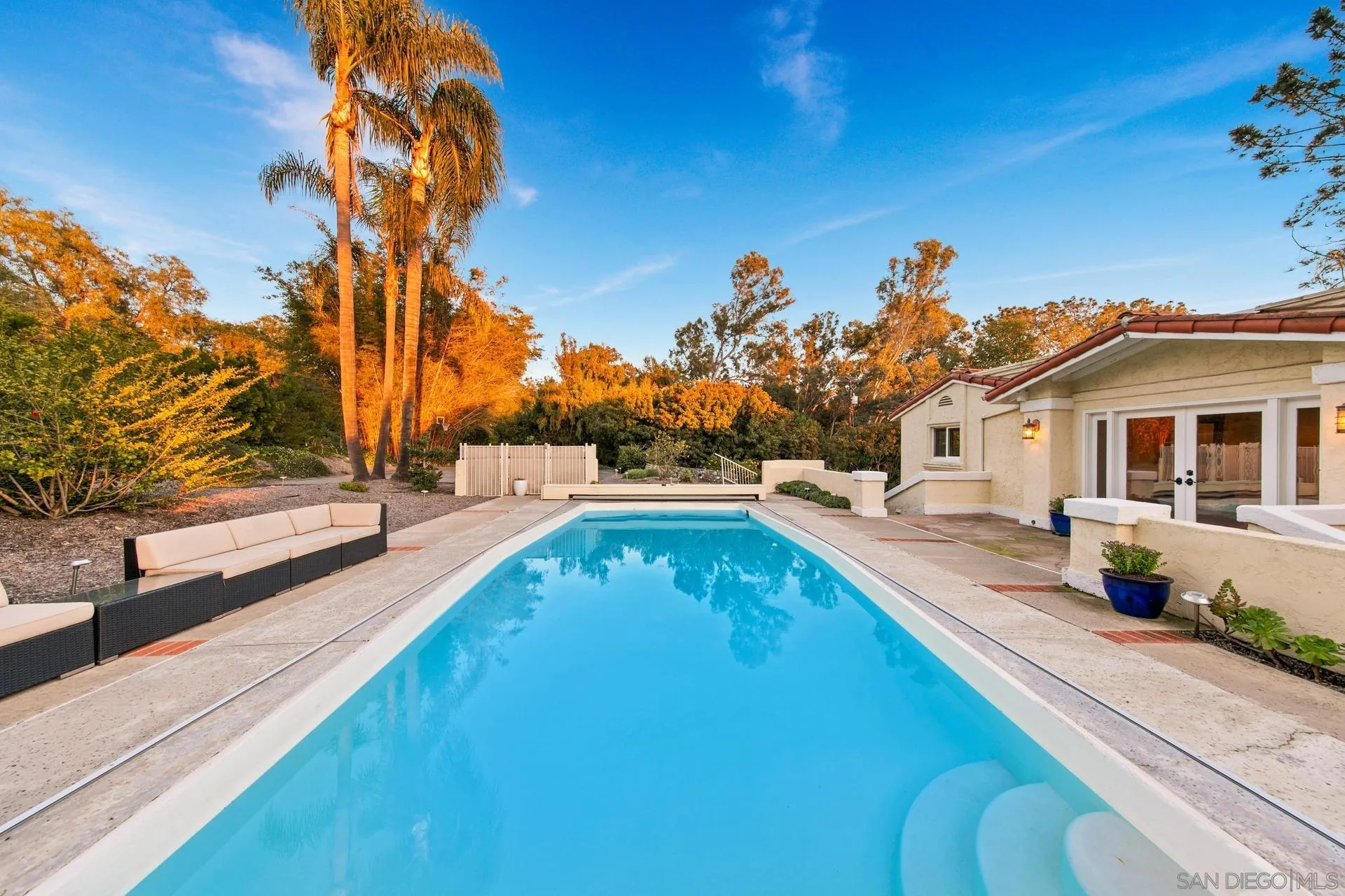 6347 Las Colinas Rancho Santa Fe, CA 92067 - Photo 4 of 24 a view of a house with swimming pool