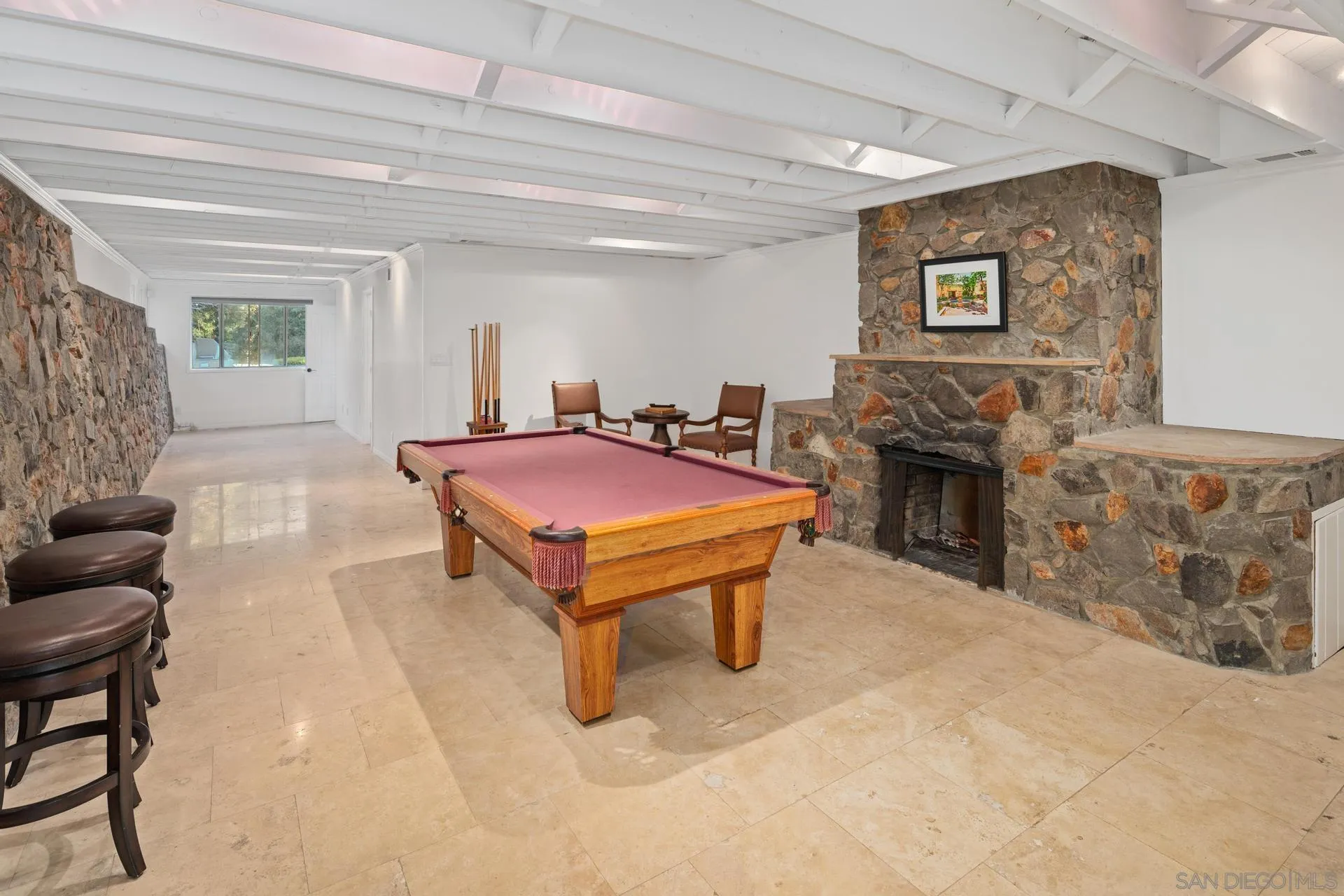 6347 Las Colinas Rancho Santa Fe, CA 92067 - Photo 9 of 24 a bedroom with furniture and a fireplace