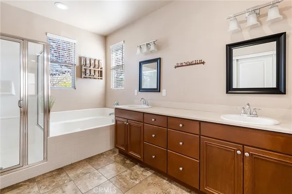 a bathroom with a bathtub and a sink