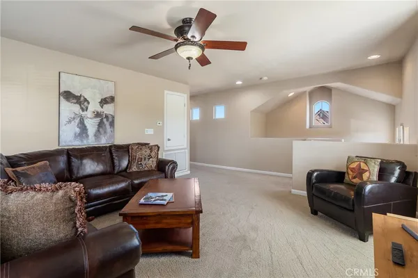 a workspace with furniture and a window