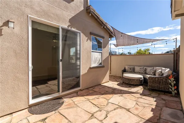 a balcony view with a couch