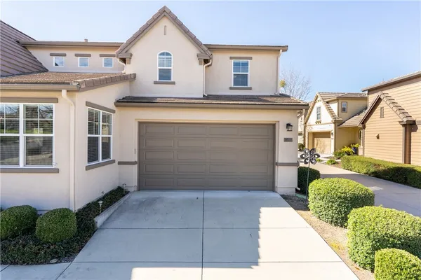a view of a house with a garage