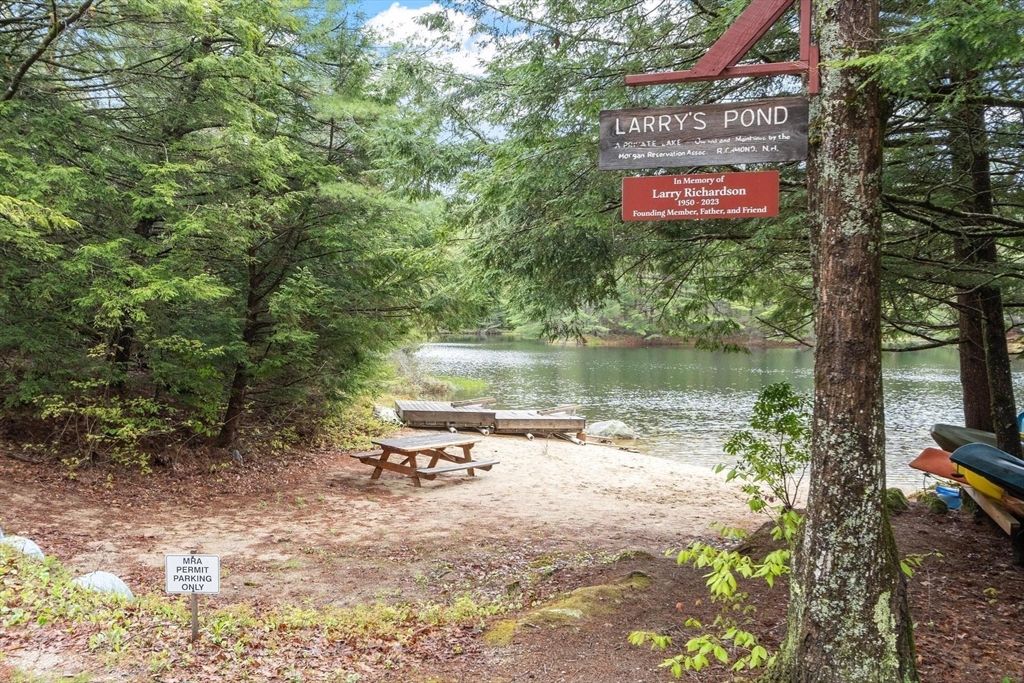 42 Bowl Road Richmond, NH 03470 - Photo 18 of 20 a view of a lake with sitting area