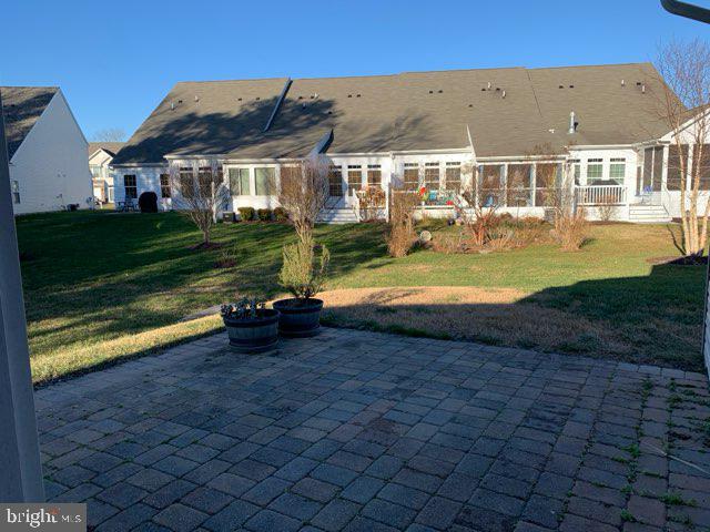36405 Ridgeshore Lane Millville, DE 19967 - Photo 21 of 22 a view of a house with backyard and a garden