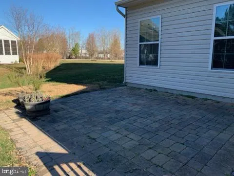 a view of a backyard of the house