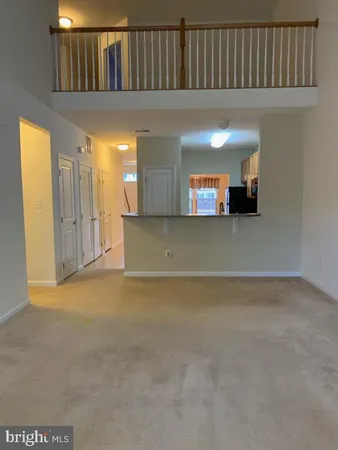a view of livingroom with kitchen