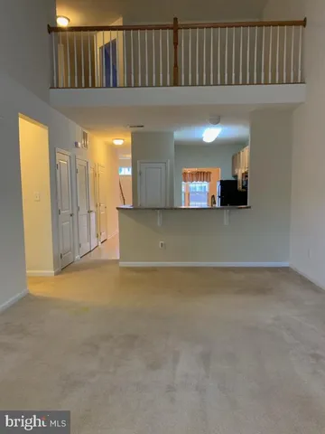 a view of livingroom with kitchen