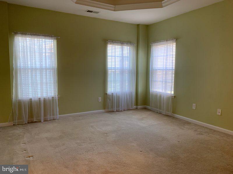 36405 Ridgeshore Lane Millville, DE 19967 - Photo 9 of 22 an empty room with windows