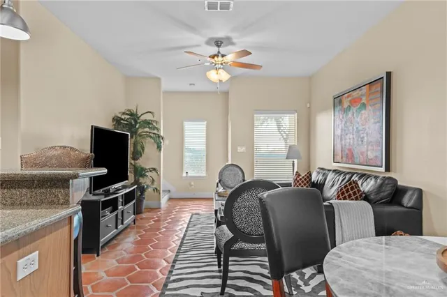 a view of a workspace with furniture