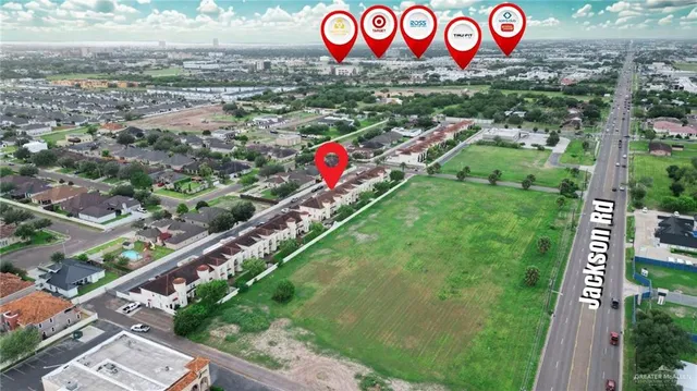 an aerial view of a house with outdoor space