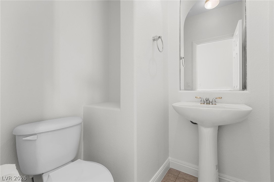11425 Rancho Portena Avenue Las Vegas, NV 89138 - Photo 30 of 58 Bathroom with toilet and tile patterned floors