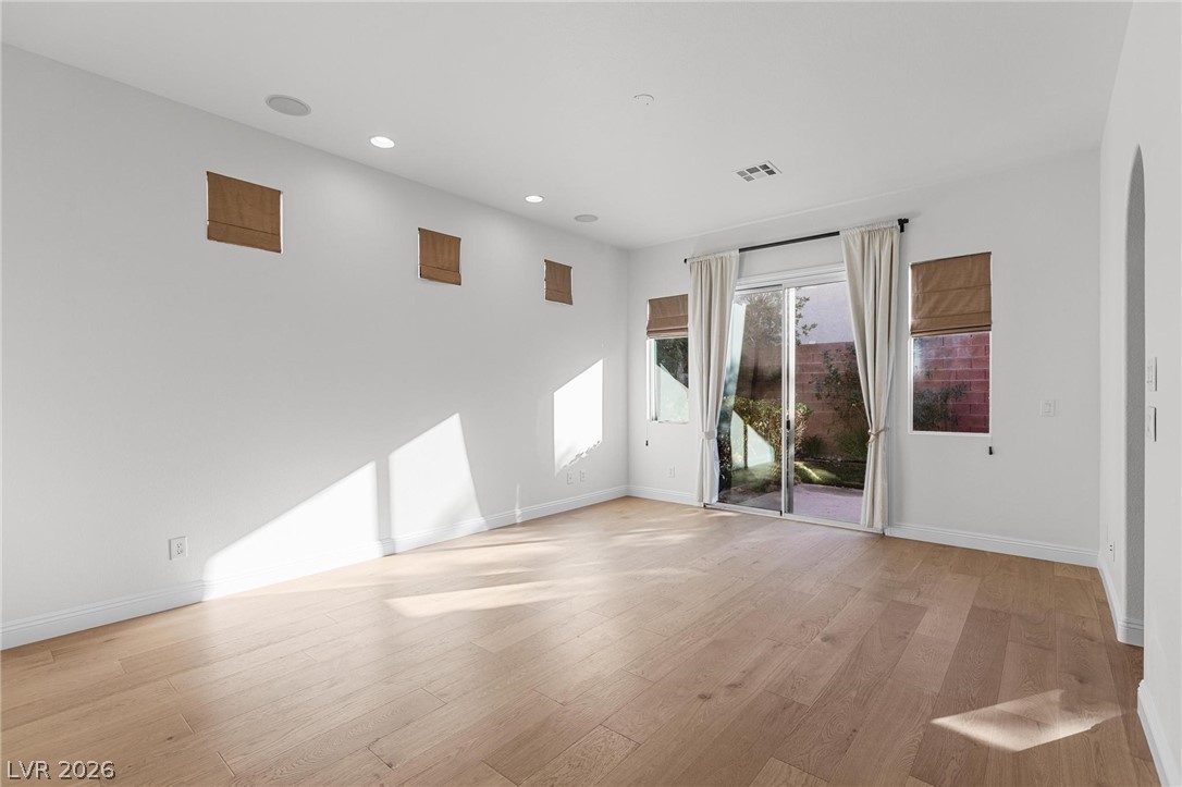 11425 Rancho Portena Avenue Las Vegas, NV 89138 - Photo 31 of 58 Spare room featuring light wood finished floors and recessed lighting
