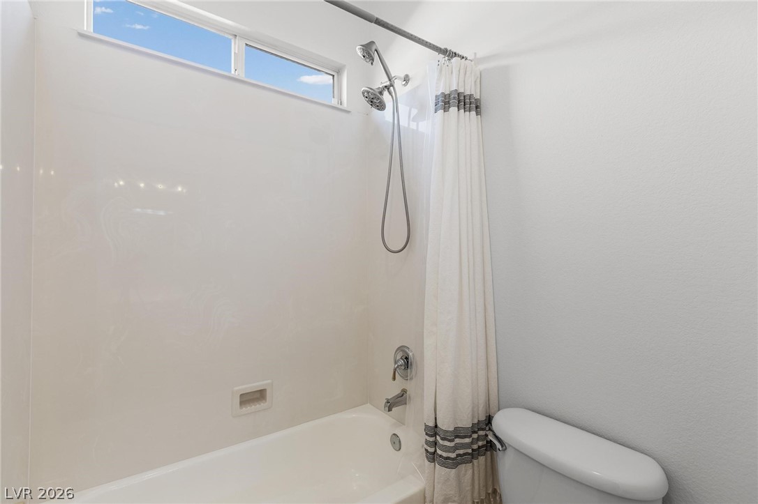 11425 Rancho Portena Avenue Las Vegas, NV 89138 - Photo 41 of 58 Full bathroom with shower / bath combo and toilet