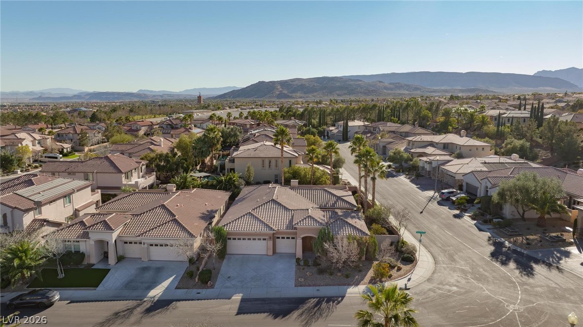 11425 Rancho Portena Avenue Las Vegas, NV 89138 - Photo 52 of 58 Aerial view of residential area featuring a mountain backdrop