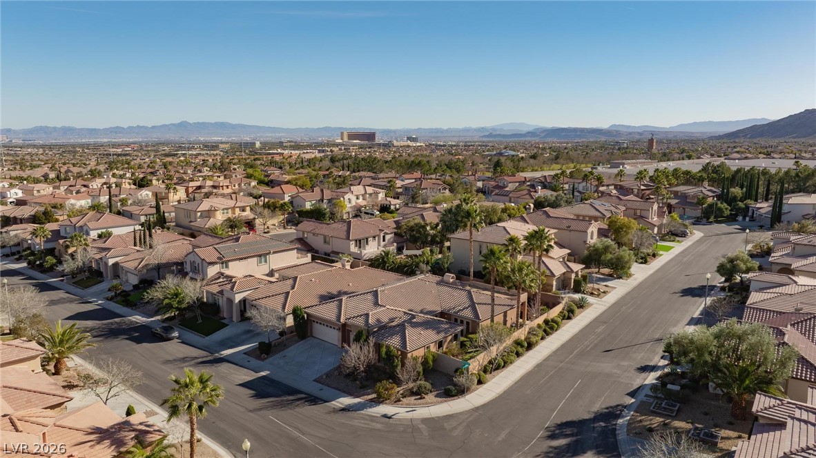 11425 Rancho Portena Avenue Las Vegas, NV 89138 - Photo 53 of 58 Aerial view of residential area with a mountainous background