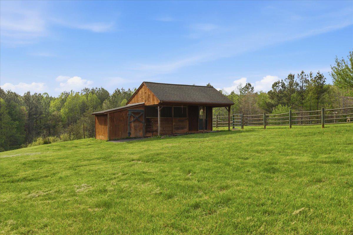 15240 Sheads Mountain Road Rixeyville, VA 22737 - Photo 49 of 70 Great Hay Barn with lush greenery and fencing