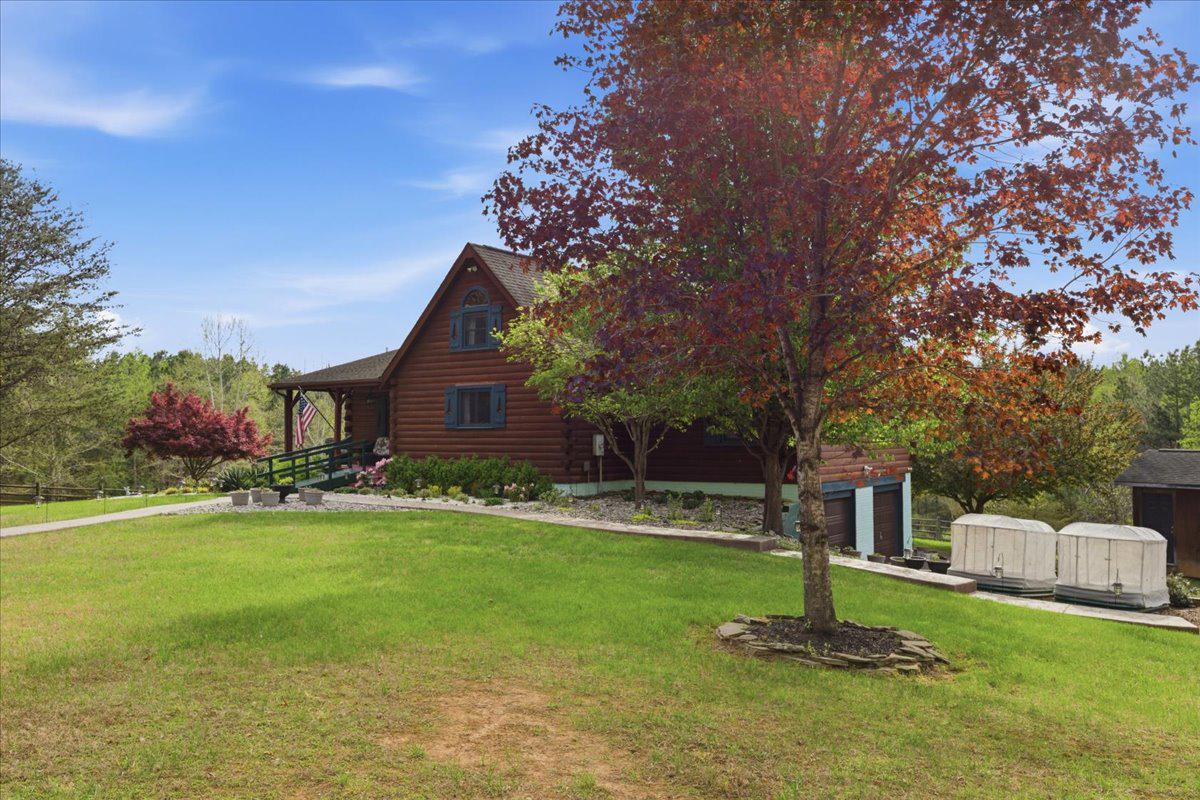 15240 Sheads Mountain Road Rixeyville, VA 22737 - Photo 5 of 70 Lovely log home amidst vibrant nature.