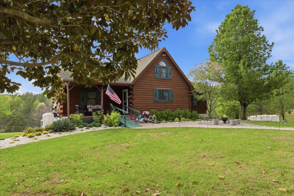 15240 Sheads Mountain Road Rixeyville, VA 22737 - Photo 64 of 70 Meticulously maintained log home w/ lush greenery.
