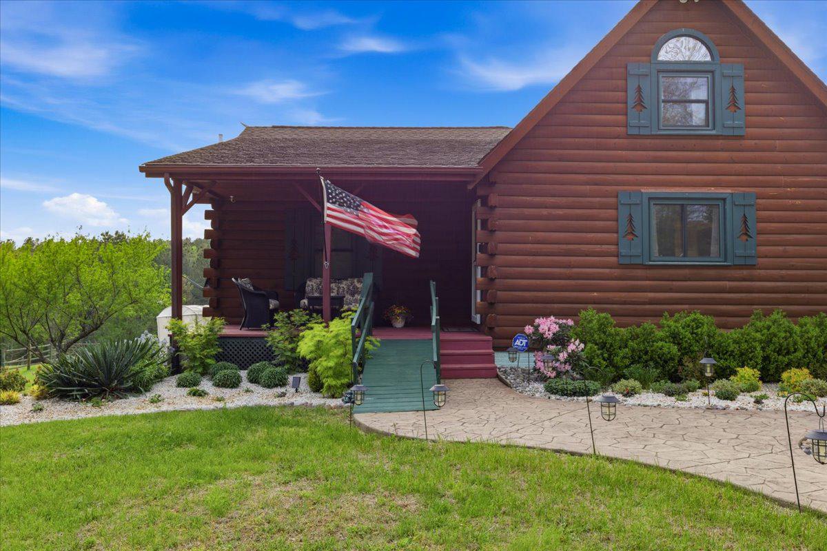 15240 Sheads Mountain Road Rixeyville, VA 22737 - Photo 65 of 70 Lovely landscaping and welcoming porch