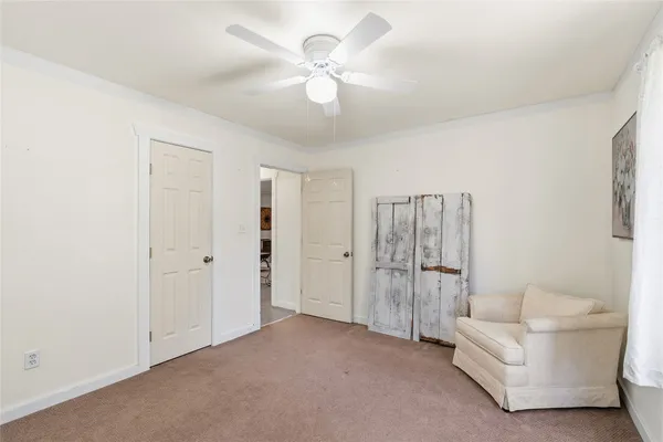 a view of snow on the roadside