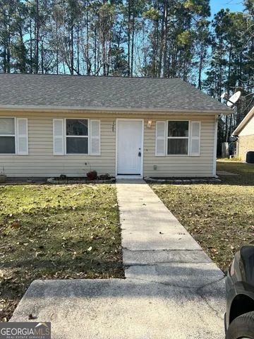 a front view of house with yard