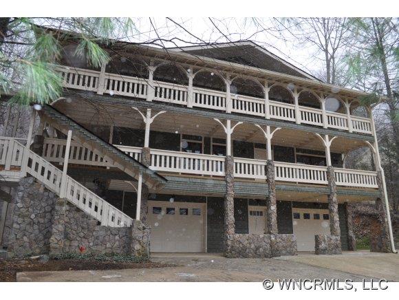 305 Nottingham Road Maggie Valley, NC 28751 - Photo 1 of 10 a view of a house with a window