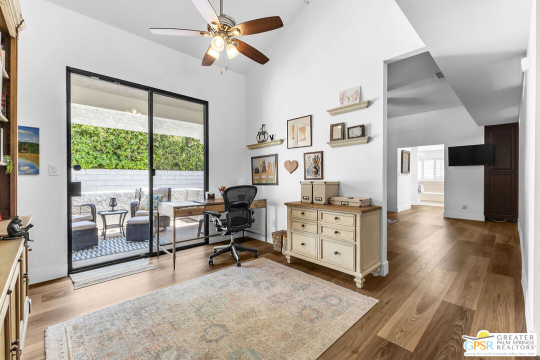 12 Santa Clara Drive Rancho Mirage, CA 92270 - Photo 17 of 34 a view of workspace with wooden floor and windows