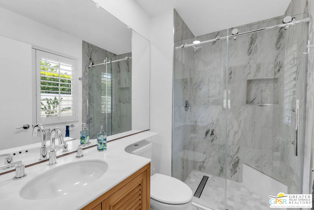 12 Santa Clara Drive Rancho Mirage, CA 92270 - Photo 26 of 34 a bathroom with a sink toilet and shower