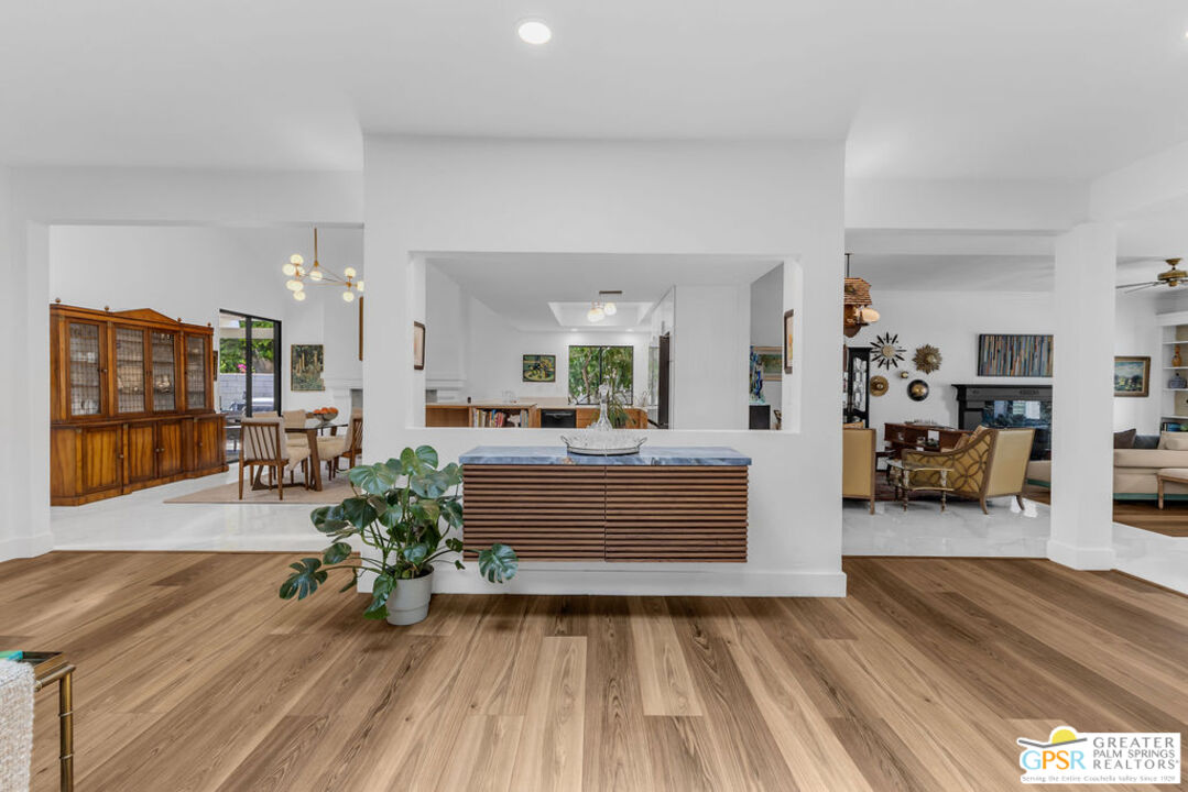 12 Santa Clara Drive Rancho Mirage, CA 92270 - Photo 3 of 34 a living room with furniture and a wooden floor