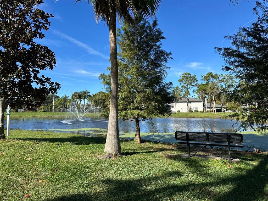 5613 Blue Shadows Court, Unit 2 Orlando, FL 32811 - Photo 24 of 26 a garden view with a seating space