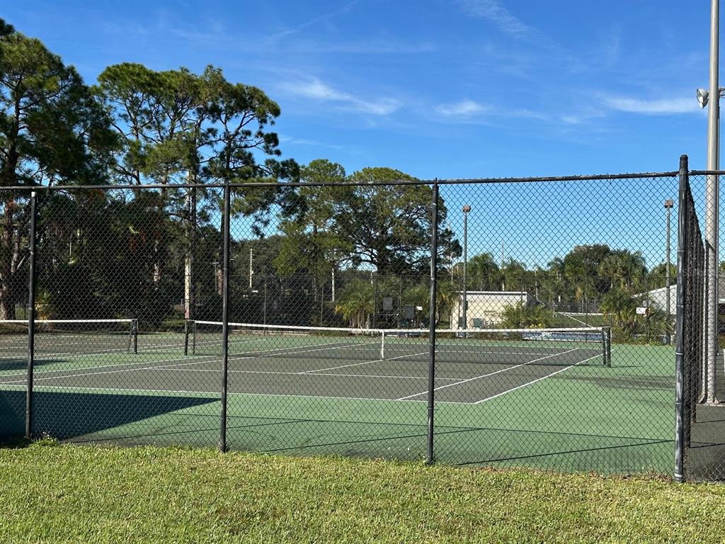 5613 Blue Shadows Court, Unit 2 Orlando, FL 32811 - Photo 25 of 26 a view of a basketball court