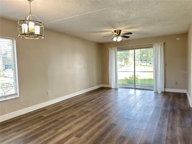 a kitchen with cabinets appliances and a sink