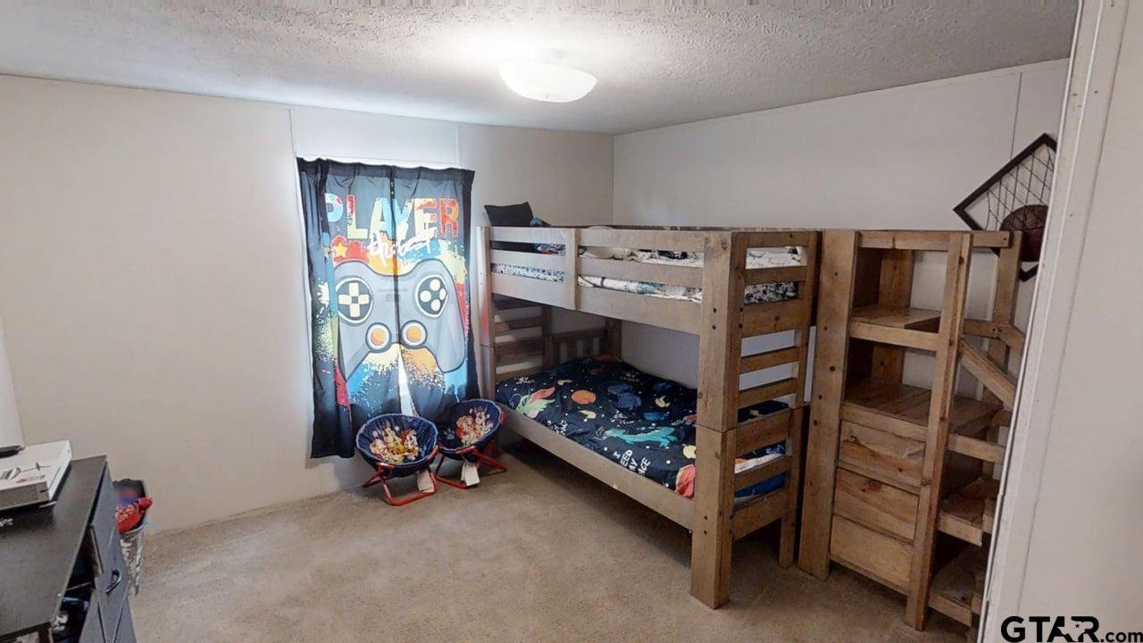 16910-c R 349 C R 349 Winona, TX 75792 - Photo 16 of 19 a bedroom with bunk bed