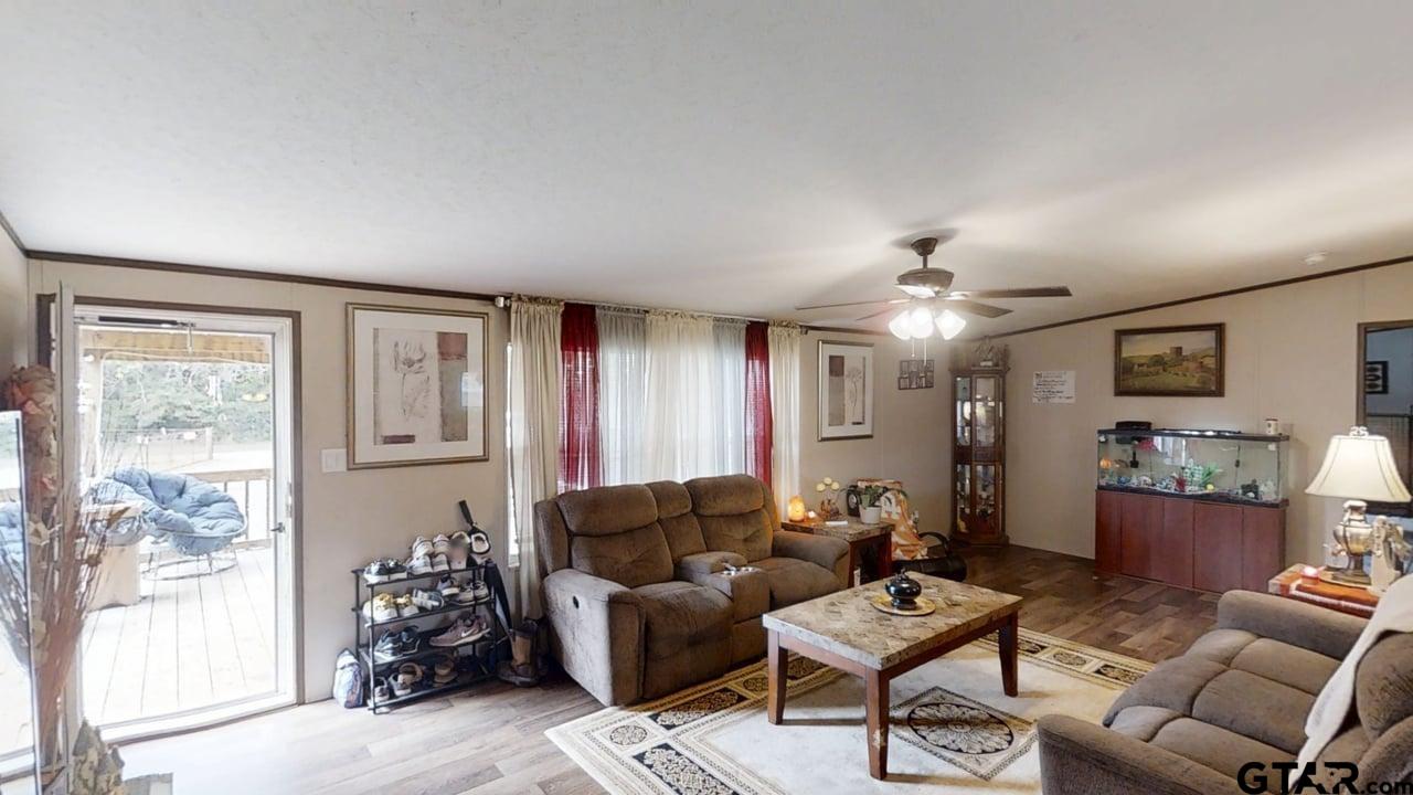 16910-c R 349 C R 349 Winona, TX 75792 - Photo 2 of 19 a living room with furniture and a window