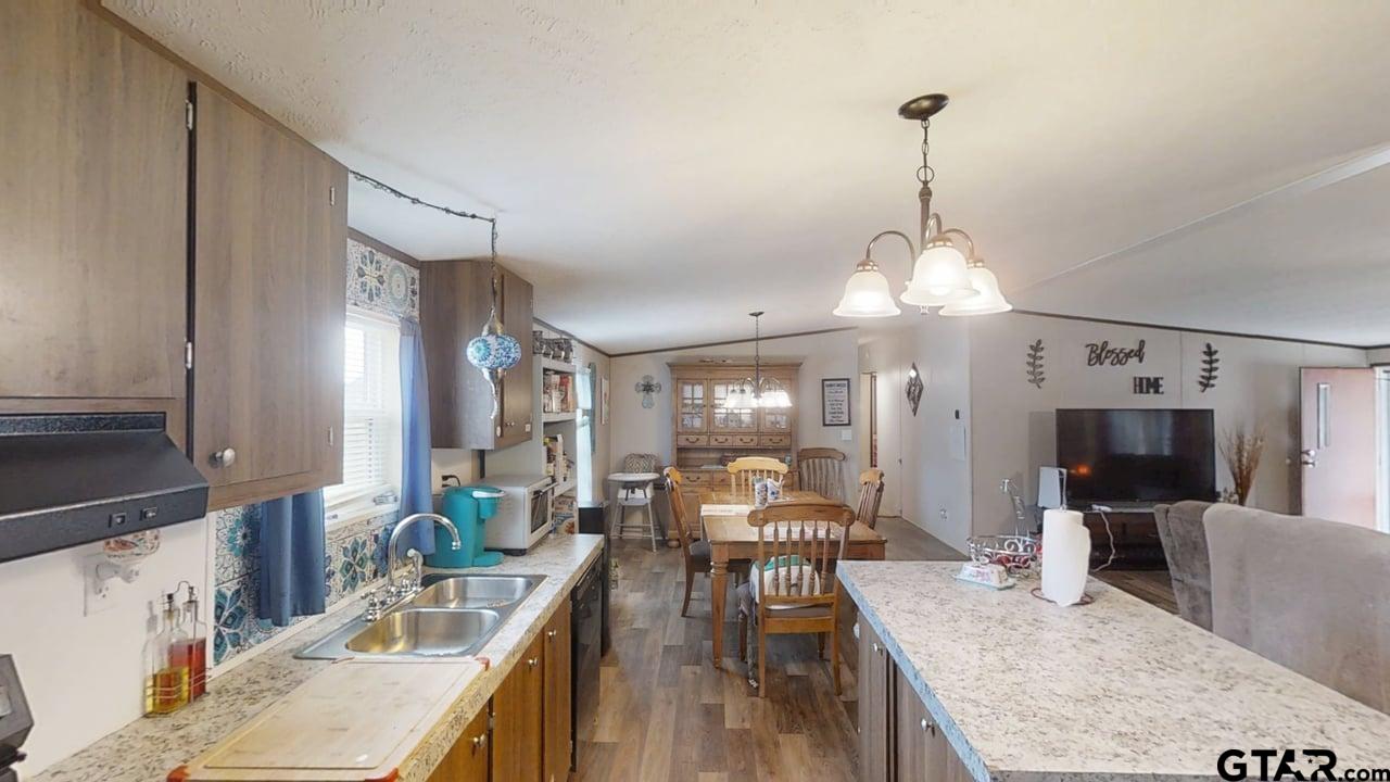 16910-c R 349 C R 349 Winona, TX 75792 - Photo 7 of 19 a view of a living room and kitchen
