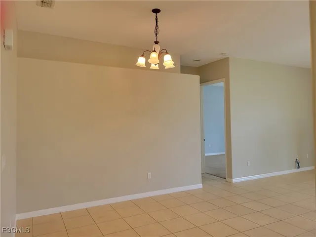 a view of a chandelier in a room