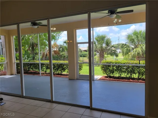 a view of a room with a large window